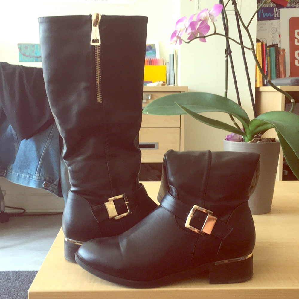Tall black leather boots with gold accents